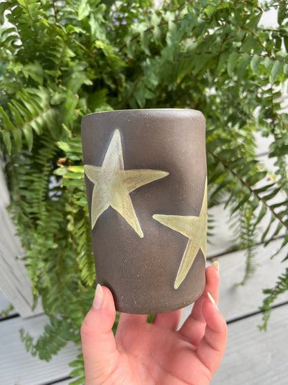 Green Star Mug on Brown Clay